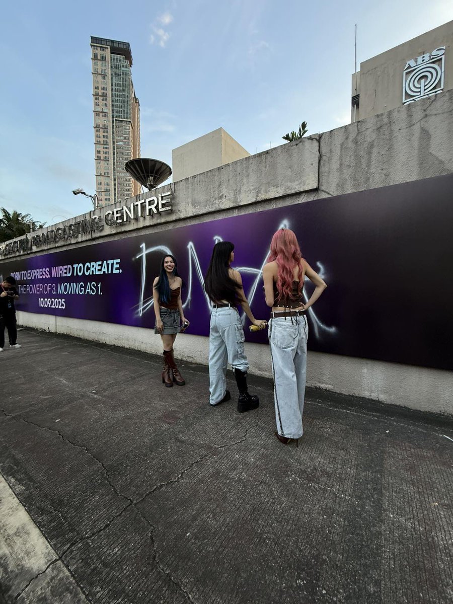 ABSCBNpr's tweet photo. BREAKING: The power of three leaves their mark.
#DNA finally reveals their name — spray-painted across their own billboard.
#WiredToCreate https://t.co/nVRqcAFBTk