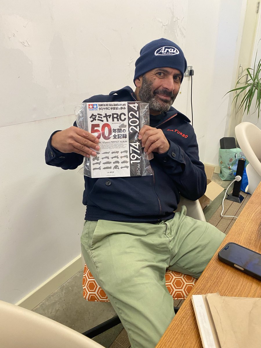 Perfect reading material at the wonderful Sunday Scramble yesterday. <a href="/harrismonkey/">chris harris</a> level of Tamiya fandom is always a joy! 

Thanks to @nicktrott27 and <a href="/27_works/">TwentySeven Works</a> for a mint 1974 Tamiya catalogue and hosting! 

#Tamiya #twentysevenworks #wearescramblers #BicesterMotion