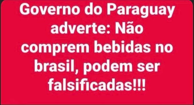 A red rectangular sign with white text in Portuguese. The text reads "Governo do Paraguai adverte: Não comprem bebidas no brasil, podem ser falsificadas!!!".