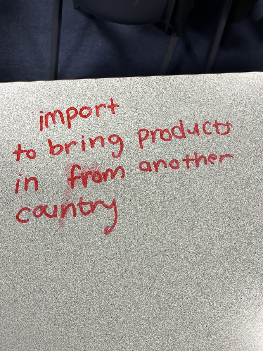 S3 business pupils learning about Globalisation 🌎. They love to write on the tables 👀.