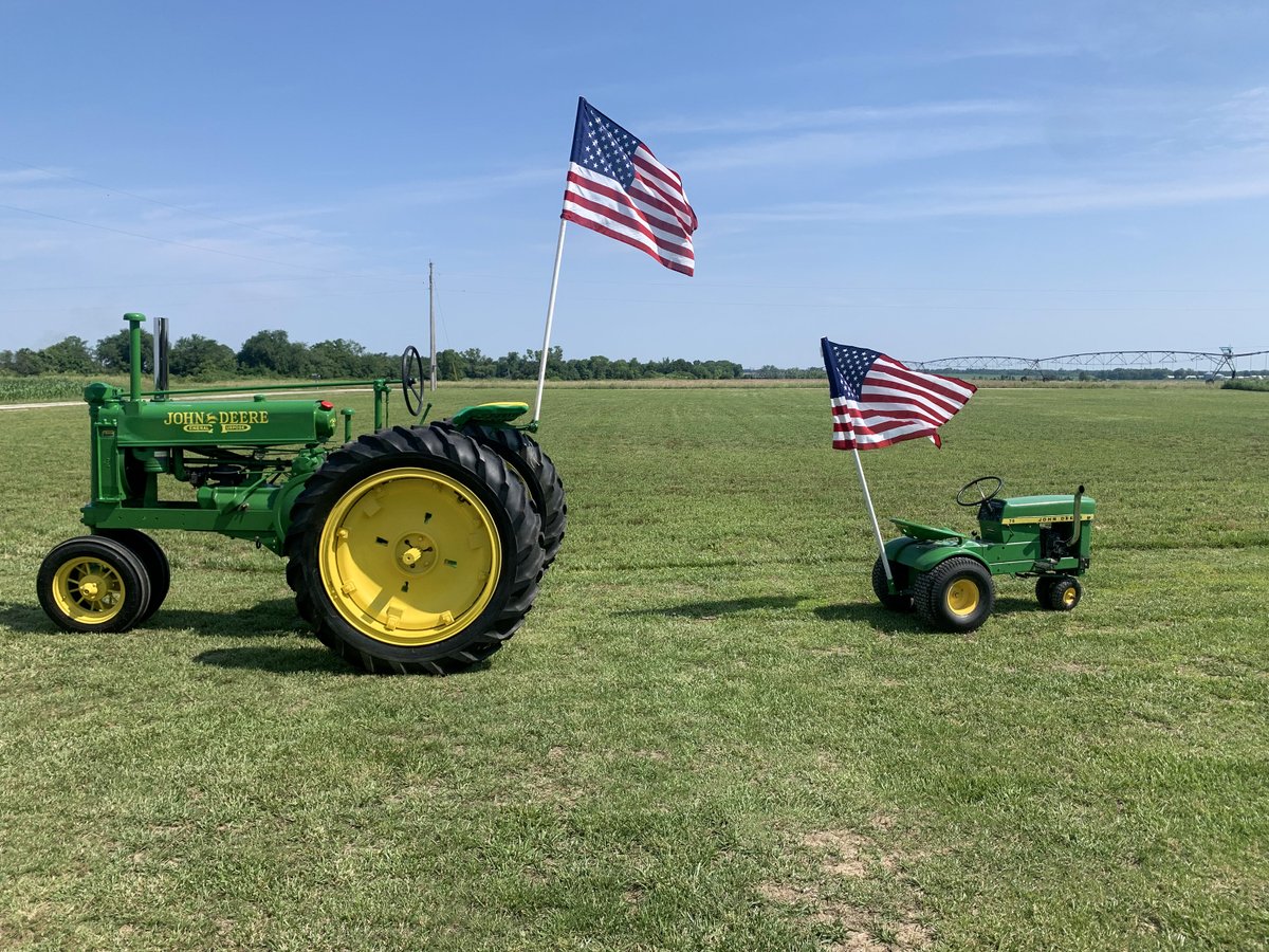 Hello, October! 👋 We've turned the page on the Heritage Tractor calendar to our October photo winner: a classic John Deere tractor and mini version proudly displaying the stars and stripes 🇺🇸