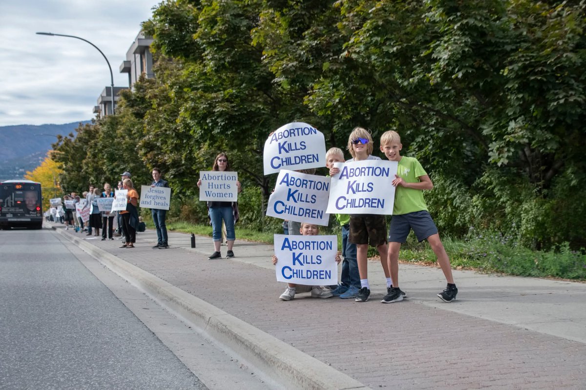 Krista_Krohn's tweet photo. Huge Turnout for Life Chain 2025 in Kelowna!
A massive crowd of 475 people participated in the Kelowna Life Chain on Sunday, more than double the 210 who came out just one year ago.
Several people commented on the "Charlie Kirk effect," the reaction to the horrible assassination of Turning Point USA's Charlie Kirk, as one reason for the increased turnout. Kirk was a passionate defender of the unborn who was not averse to publicly speaking out on their behalf, and his shocking death has certainly motivated Christians around the world to be more vocal and bold.
There was, however, another factor at play in Kelowna today: the "Praxis effect." Praxis is a Kelowna-based Christian church holding Sunday services at the downtown Rotary Centre for the Arts.
Their leadership team, headed by Pastor Josh Dool, has caught fire for the cause of life and was instrumental in inspiring many, perhaps as many as half of all those in attendance, to come out to Life Chain. Kelowna Right to Life is very grateful for Praxis' involvement and promotion of Life Chain 2025!
People of all ages and backgrounds came out today, including several church leaders, priests, and pastors. Notably missing was local media. It seems castanet, the Courier, Global TV and anyone else in local leftist media couldn't be bothered to report on nearly 500 people, probably the largest public demonstration of the year in Kelowna. Go figure. Your bias is showing!
Thank you to absolutely everyone who attended Life Chain 2025. Keep speaking on behalf of the unborn throughout the year, and we'll see you at Life Chain 2026!