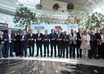 A man speaking at a podium with a backdrop displaying "Eğitimden Bir Kare Fotoğraf Sergisi" and dates 6-12 EYL 2023. Multiple people in formal attire cutting a red ribbon in a spacious indoor area with trees and a glass ceiling. Photographs on display behind a metal fence, including images of children and damaged buildings. Text on banners includes "Millî Eğitim Bakanlığı" and "Gazze".