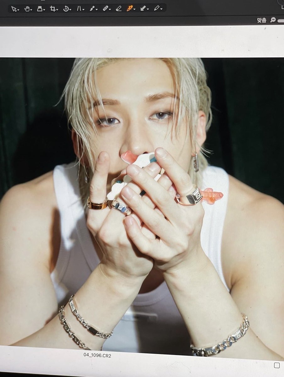 Behind the calm façade, a quiet storm lingers a trace of thought, a flicker of defiance. Silver light grazes the skin, blurring the line between strength and surrender. In the stillness, I exist between illusion and truth unguarded, fleeting, yet vividly alive.