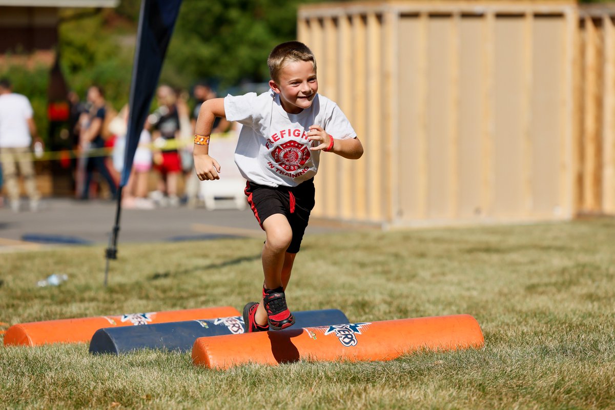BearsOutreach's tweet photo. Former Bears Tight-End, Kaseem Sinceno, hosted a Mini Monsters Zone at Carpentersville Fire Department's Fire Safety Month Celebration.