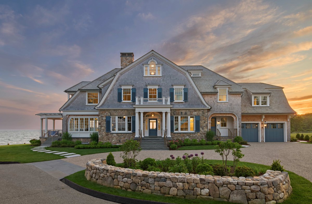 Sitting pretty on the northeastern coast of #Connecticut, our newly completed Coastal Gambrel Shingle features an open floor plan with ample glass to maximize the views. See more of the home here: bit.ly/gambrel-shingle #architecturelovers #luxuryhomes
