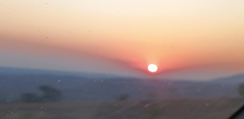 Sunset from Chankhungu. Effect of smoke and dust.