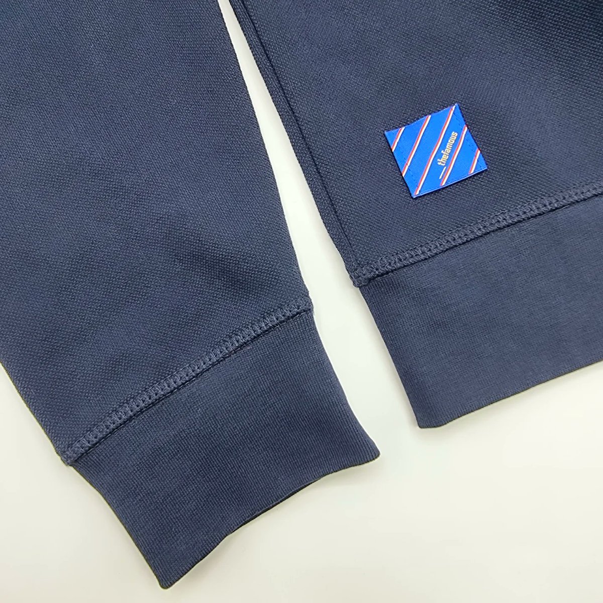 ___thefamous's tweet photo. New Famous Bar Sweatshirt. Certified organic cotton. Lighter 280gsm weight, perfect for layering or down the pub on match day 🟥⬜🟦 https://t.co/2cpzwL3E3c