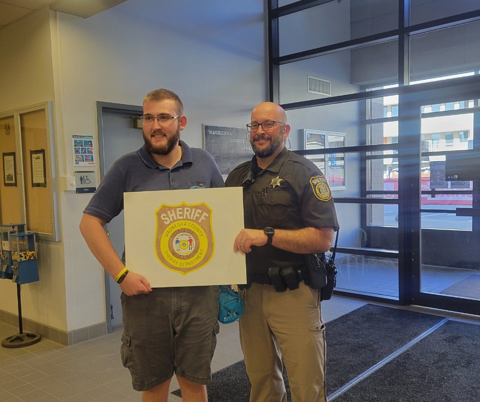 On October 1st, Collin came to present a piece of his artwork to Waukesha County Court Services Deputy Nicholas Kibler of the Waukesha County Sheriff’s patch logo.
Collin’s random acts of kindness throughout the Waukesha community are what turns this world into a better place.