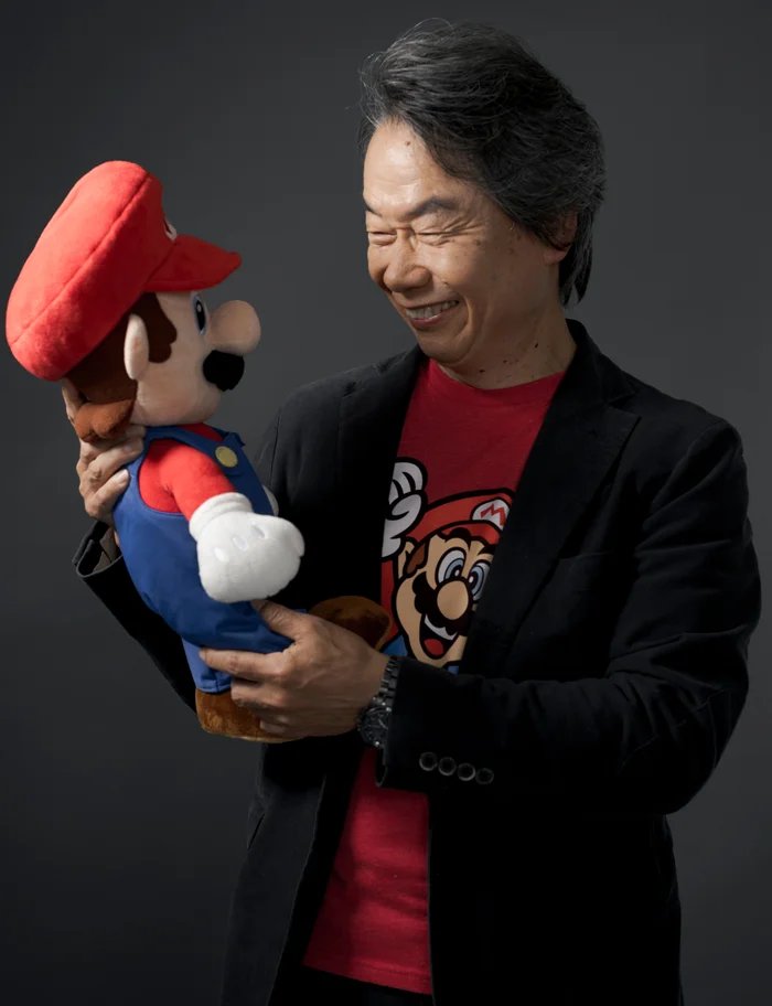 <a href="/__thingamajig/">jeremy</a> I know everyone is gonna point to the younger one with the assortment of plushes but i do love this picture of older Miyamoto looking at Mario.