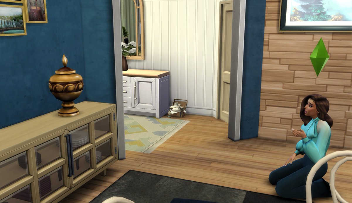 Elle lui parlait encore, comme si la voix pouvait franchir les cendres. La maison semblait écouter, suspendue à son souffle tremblant. Tout ce qu’il restait d’eux tenait dans cette urne dorée, posée là, entre le passé et le silence. 🕯️ 
#simstoberjour23 #cendres