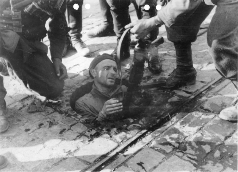 WW2Facts's tweet image. Polish resistance fighter surrendering from his position in the sewers of the Mokotów District, Warsaw, Poland, on September 27, 1944.

#History #WWII