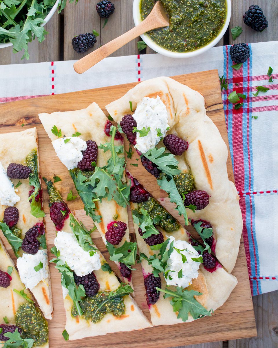 This Grilled Blackberry Ricotta Pesto Pizza is the perfect twist on the traditional pizza night! You can bake in the oven or grill the pizza dough on the BBQ &amp; then top with pesto, lemon zest ricotta, blackberries, &amp; arugula.

oregon-berries.com/recipe/grilled…

#oregonberries #blackberries