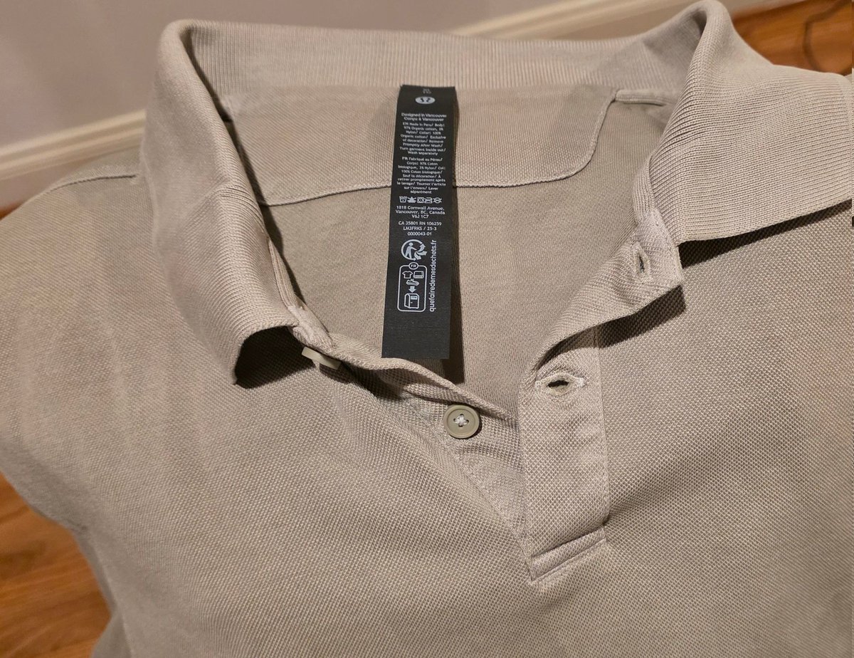 ultimaterealist's tweet photo. @lululemon so you charge 75 for a shirt and I compare the quality of it to a shirt I picked up from Macy's for about 35 with no logos and same weave.  40 dollars for that black tag tag with one stitch...  Glad this was free but good information for anyone... Last time... https://t.co/W4uLjMHZBT