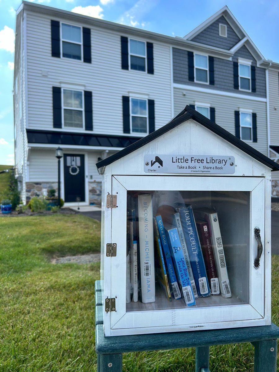 SarahNHiggins's tweet photo. The resistance begins at my front door.

Super proud of my @LtlFreeLibrary, chock full of banned books, constructed (… and reconstructed) with a little help from the local engineer, and already beloved in our neighborhood.

#CensorshipIsSo1984 | #BannedBooksWeek https://t.co/ODjZNjH2Ja
