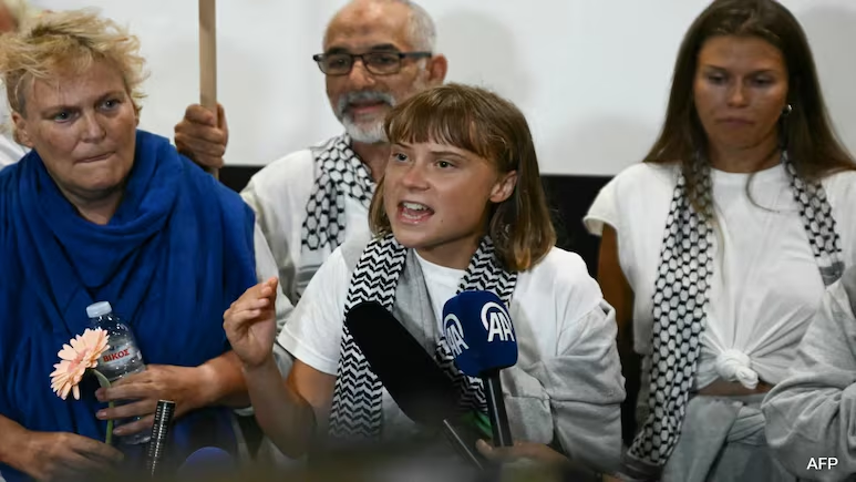 NDTVWORLD's tweet photo. Israel Deports Greta Thunberg, 160 Gaza Flotilla Activists To Greece
https://t.co/Nxty25eKSC https://t.co/HfAzKzeGVM