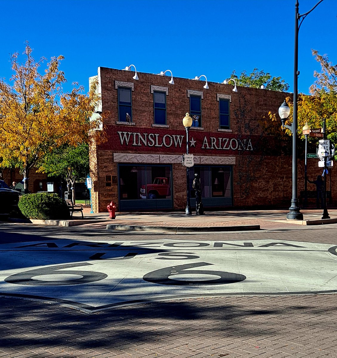 CarolGardner7's tweet photo. Take it Easy! " a-standing on a corner. In Winslow, Arizona Such a fine sight to see" Can see why this spot inspired this famous track by The Eagles! See more if interested:https://t.co/YCiWB3T66f #Winslow #Arizona #Route66 #roadtrip #USA https://t.co/8hJkQViECn