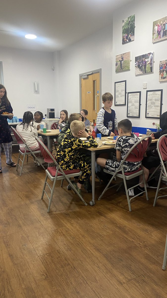 All the children have slept well and now enjoying a lovely breakfast ready for the day ahead .