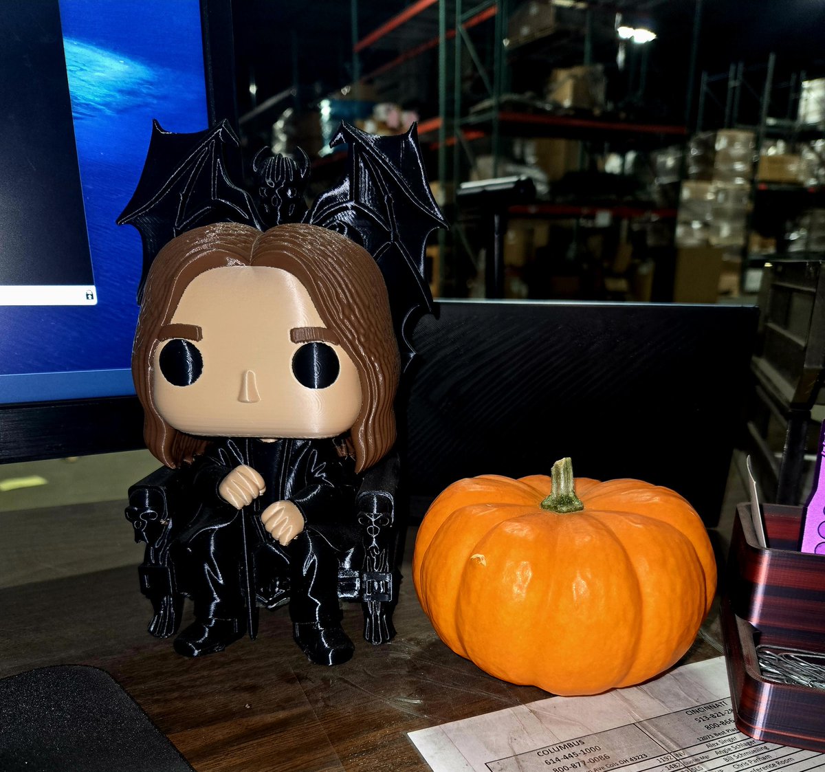 AsmodeusQueen's tweet photo. My coworker gave me a pumpkin for October. I definitely brighten up my day. I put it beside my 3d printed Ozzy on my desk. https://t.co/JdfdsOBOvz