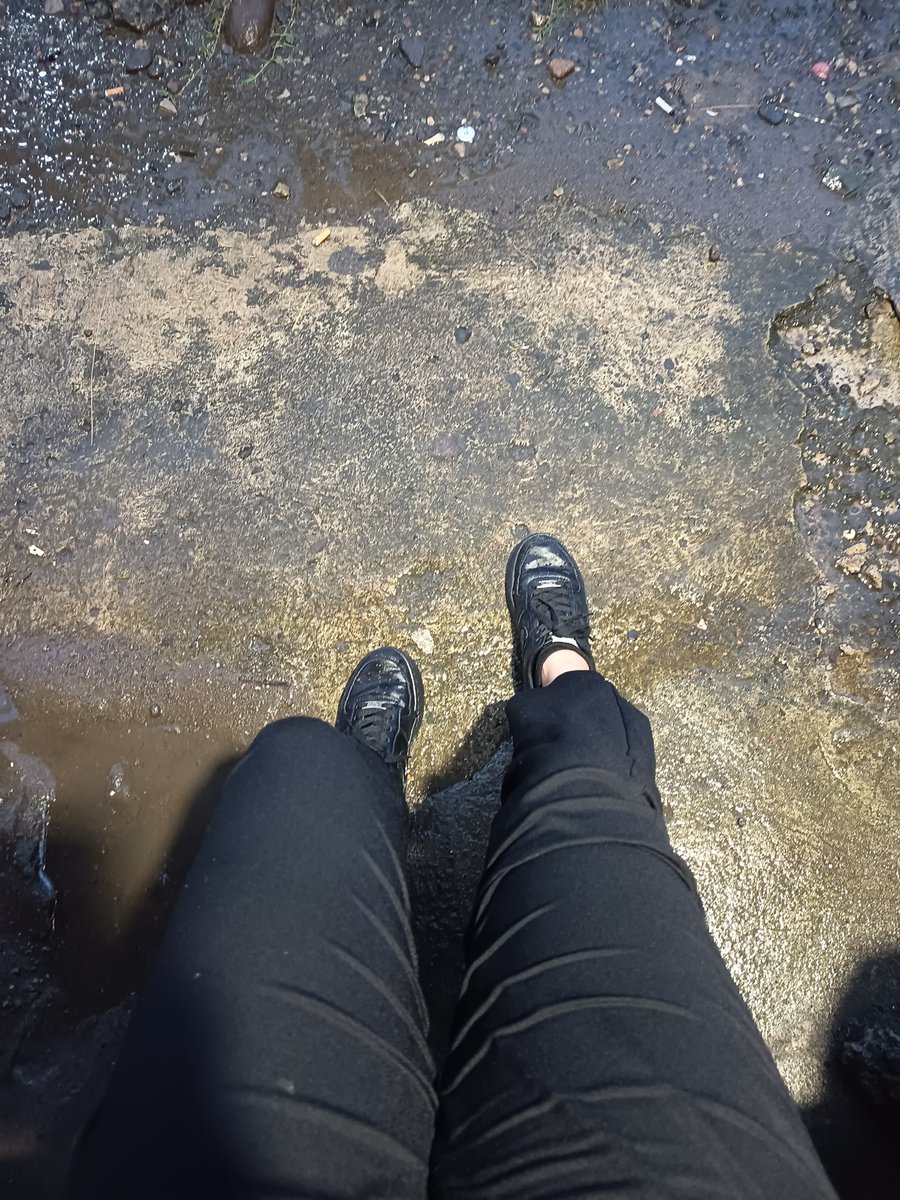 just stop by on some store coz visibility is getting blur because of heavy rain. i dont have a raincoat so here i am, Soaking in rain in the side of road