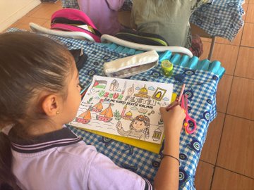 First image shows the front of a school building with a blue sign reading CUMHURIYET ILKOKULU and the Turkish flag emblem, children in colorful clothing standing on steps holding and waving Palestinian and Turkish flags. Second image depicts children on a sunny outdoor playground running and playing with Palestinian flags, some barefoot, against a background of school buildings and trees. Third image features a girl coloring a detailed drawing of Palestinian map, Dome of the Rock, ships, tents, and the number 68 on a checkered table with crayons, pencils, a water bottle, and toys nearby. Fourth image shows another girl at a table cutting or coloring a similar artwork with Palestinian symbols, ships, a girl in headscarf, flags, and landmarks on a blue mat with school bags and supplies around.