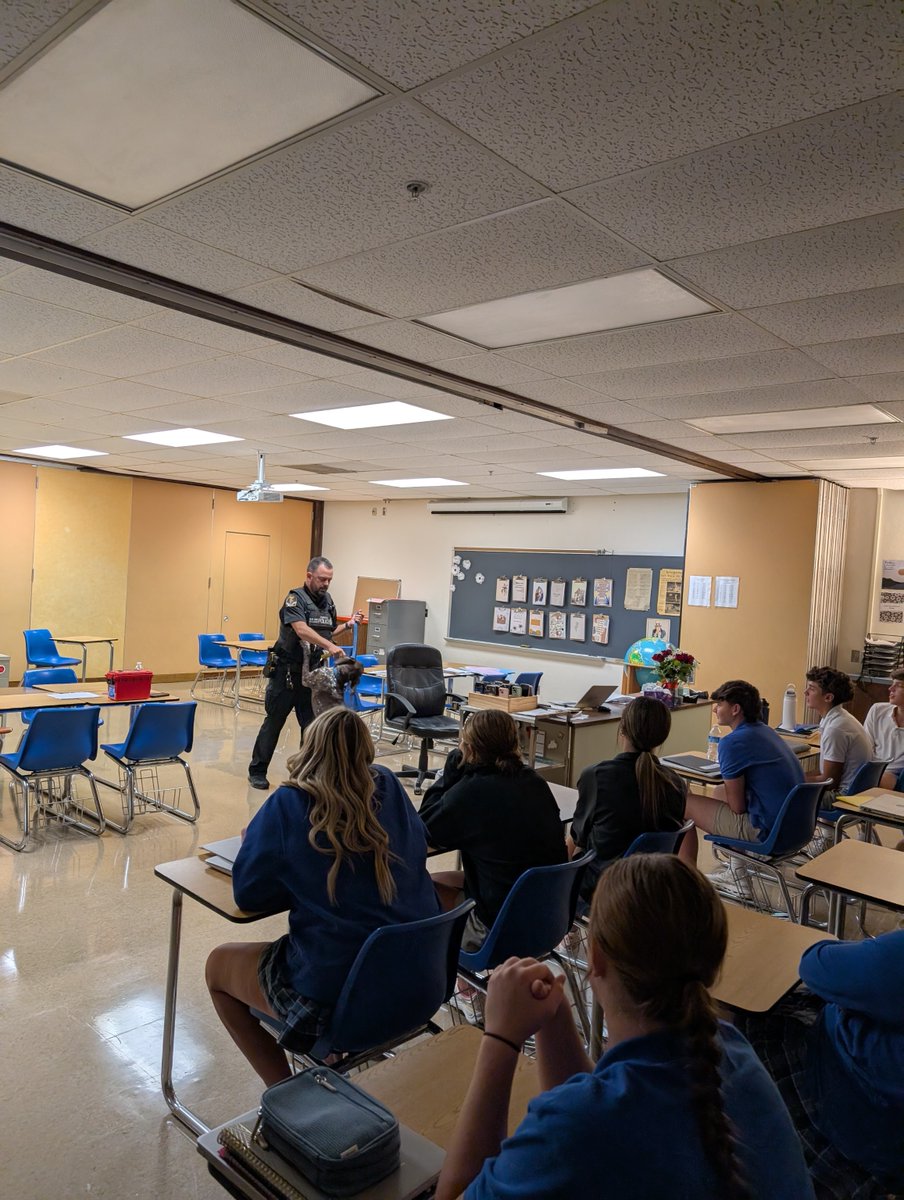 grosscatholic's tweet image. Officer Nathan Dickey, Class of 2002, visited Mrs. Mason's Criminal Justice last week. They got to meet his dog and ask questions about what it's like to be a police officer! #TeachingTuesday