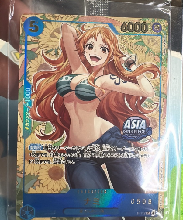 In-person shot of the Asia Region OPTCG Mini-tin Pack Set Vol. 2