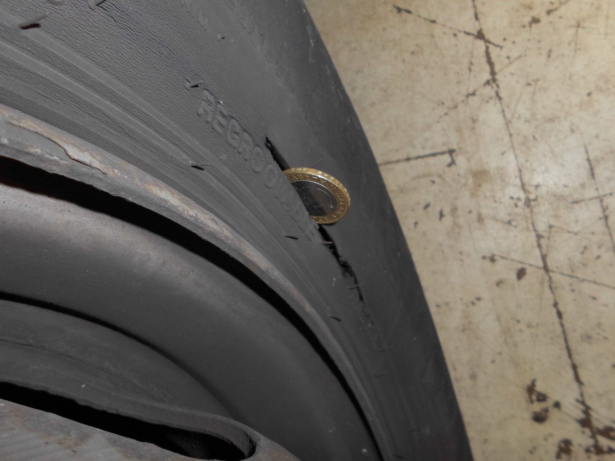 DVSAEnforcement's tweet image. Smooth (and Dangerous) Operator🎵
Tyre found with no tread and very smooth on the surface❌
Another tyre found with a cut so deep a coin could fit into it!❌
Safe to say they are no longer operating✅
#DVSA #KeepingRoadsSafe #SmoothOperator #DangerousOperator #NonCompliant