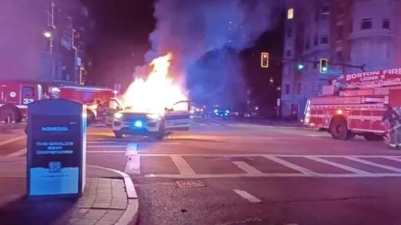 assured_media's tweet photo. 𝐁𝐨𝐬𝐭𝐨𝐧, 𝐌𝐚𝐬𝐬𝐚𝐜𝐡𝐮𝐬𝐞𝐭𝐭𝐬 - Cruiser torched as part of a series of coordinated attacks on Massachusetts police officers, officials say.

Two men were arraigned in Boston Municipal Court on Monday after a "staged and coordinated attack" in Boston's South End left a marked police cruiser in flames - an incident that was part of several other similar attacks throughout Massachusetts.

Boston Police Patrolmen's Association President Larry Calderone stated that this was connected to a series of similar attacks that occurred in Randolph, West Roxbury, Middleborough, Brockton and Fall River, spanning four counties - Norfolk, Suffolk, Bristol and Plymouth.

""This was a staged event where they closed off certain sectors of neighborhoods and streets. In our opinion, they lure police into a gauntlet and then attack them." said Calderone.

Officers arrested Julian Bowers, 18, of Cumberland, Rhode Island, after he was seen throwing objects at officers and a cruiser before a foot chase ended in his arrest on charges including malicious destruction of property over $1,200, disorderly conduct, assault and battery on a police officer and resisting arrest, according to Boston police.

Officers also arrested William Cantwell, 19, of Warwick, Rhode Island, after he was seen repeatedly striking a cruiser with an orange pole; police said a search of his bag turned up two packages of marijuana edibles, and he faces charges including malicious destruction of property over $1,200, disorderly conduct, assault and battery on a police officer, resisting arrest and possession of Class D marijuana, according to the department.

Cantwell was released after posting $1,000 bail and Bowers was released on $500 bail. Both men must stay out of Boston unless they’re there for court business or seeing their attorney.

#Boston #Police #Racing #Fire #Arson #Takeover #StreetTakeover #War #Insurgency #Revolution #Massachusetts #Gaza #Palestine #Hamas #Israel