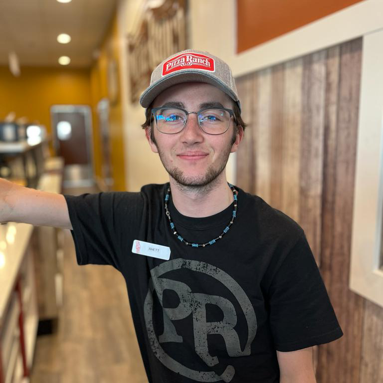It's #TeamMemberTuesday! Meet Rhett, a team member since we opened. One of his goals is to be an actor, so you'd better remember his name!

Why does he love working at PR? Amazing food, a fun team, &amp; a lively environment.

His favorite pizza? Either the Sweet Swine or Bronco.