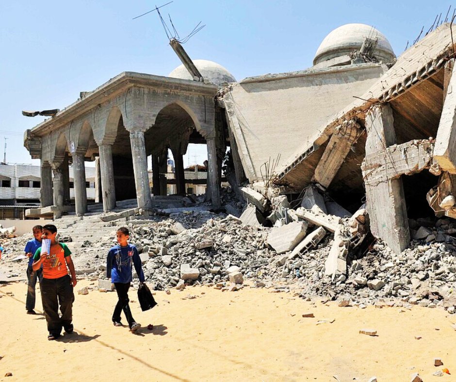 OccupyWallStNYC's tweet image. Children walk past a destroyed mosque in Gaza, 2009.

It could be yesterday. Gaza has endured decades under blockade and occupation—and in the two years since Oct. 7, 2023, Israel’s genocidal assault has erased entire families &amp;amp; neighborhoods.

FREE PALESTINE.