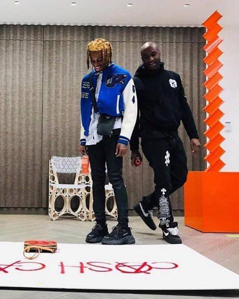 FleeksDaily's tweet photo. Playboi Carti and Virgil Abloh's "Whole Lotta Red" spray paint poster on display in Paris (2025). https://t.co/Iw2DameNZf