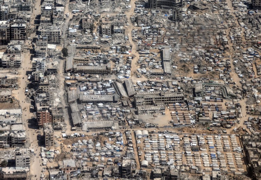 Photo by Heidi Levine (July 30, 2025) showing an aerial view of Gaza destruction, taken during a Royal Jordanian military flight for a humanitarian aid mission.
