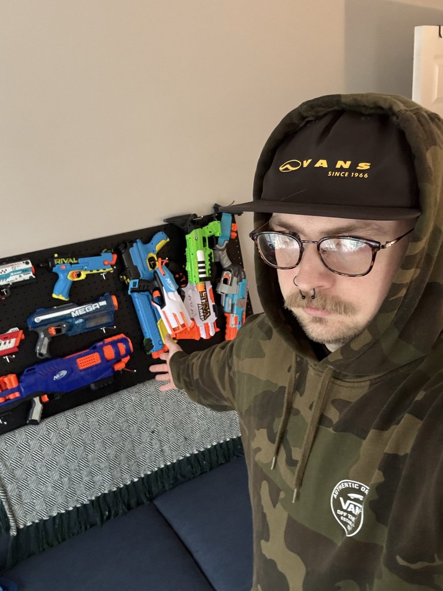 zwappo's tweet photo. I’m having a kid in Jan but I still find time to salvation an old pegboard and spray paint it so I can finally display some of my nerf blasters (I have so many more and will absolutely be getting more pegboards) https://t.co/1QZnp0Rm8W