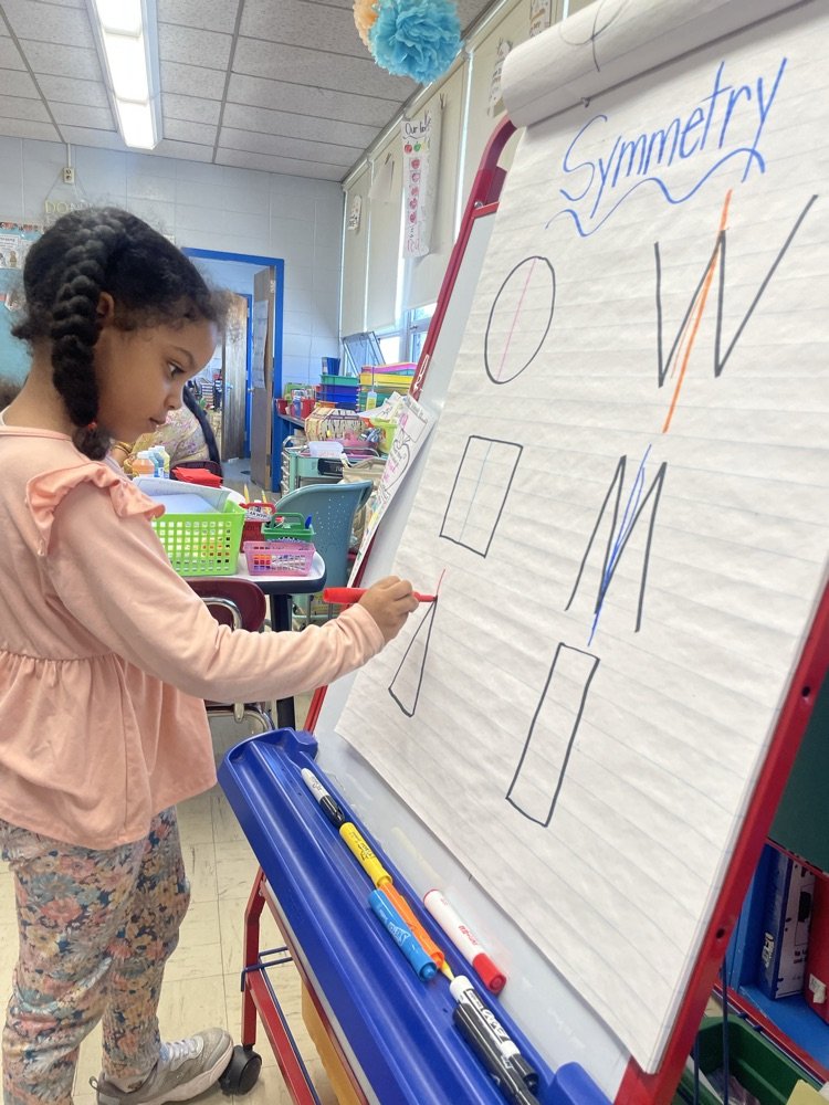 Today's first play of the day…Pumpkins! Mrs. Tornambe’s class explored symmetry and simple sentences through pumpkin fun! Students, at all grades, can check out their creative pumpkin designs which are in display outside of Mrs. Tornambe’s classroom. 
#GreatnessStartsHere