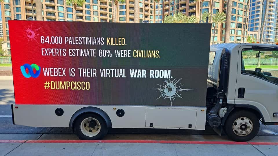 Bridge2Humanity's tweet photo. SPOTTED ON THE GROUND AT WEBEX ONE SAN DIEGO:

@Cisco was busy promoting its collaboration suite, trying to sell more Webex products and create media buzz for itself at #WebexOne last week in San Diego.

The same technology being used by the Israeli military in its genocide in 🇵🇸 https://t.co/Ou1ccqPVYY