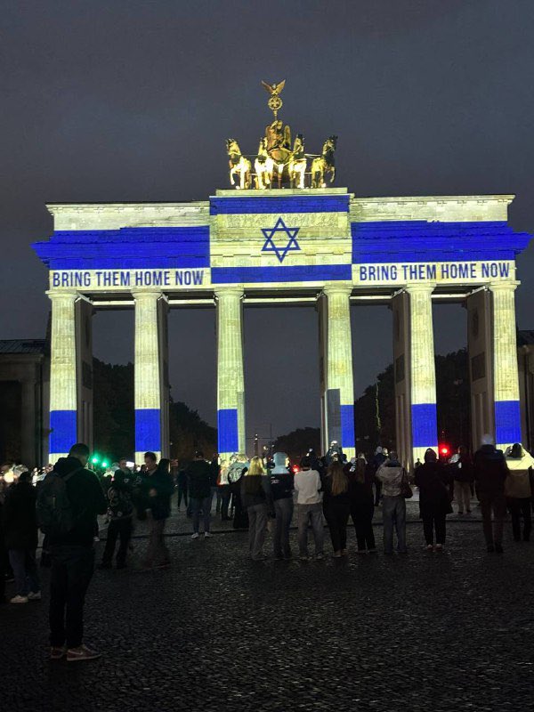Brandenburg Gate in Berlin tonight, lit up with the Israeli flag and message of solidarity with the hostages.