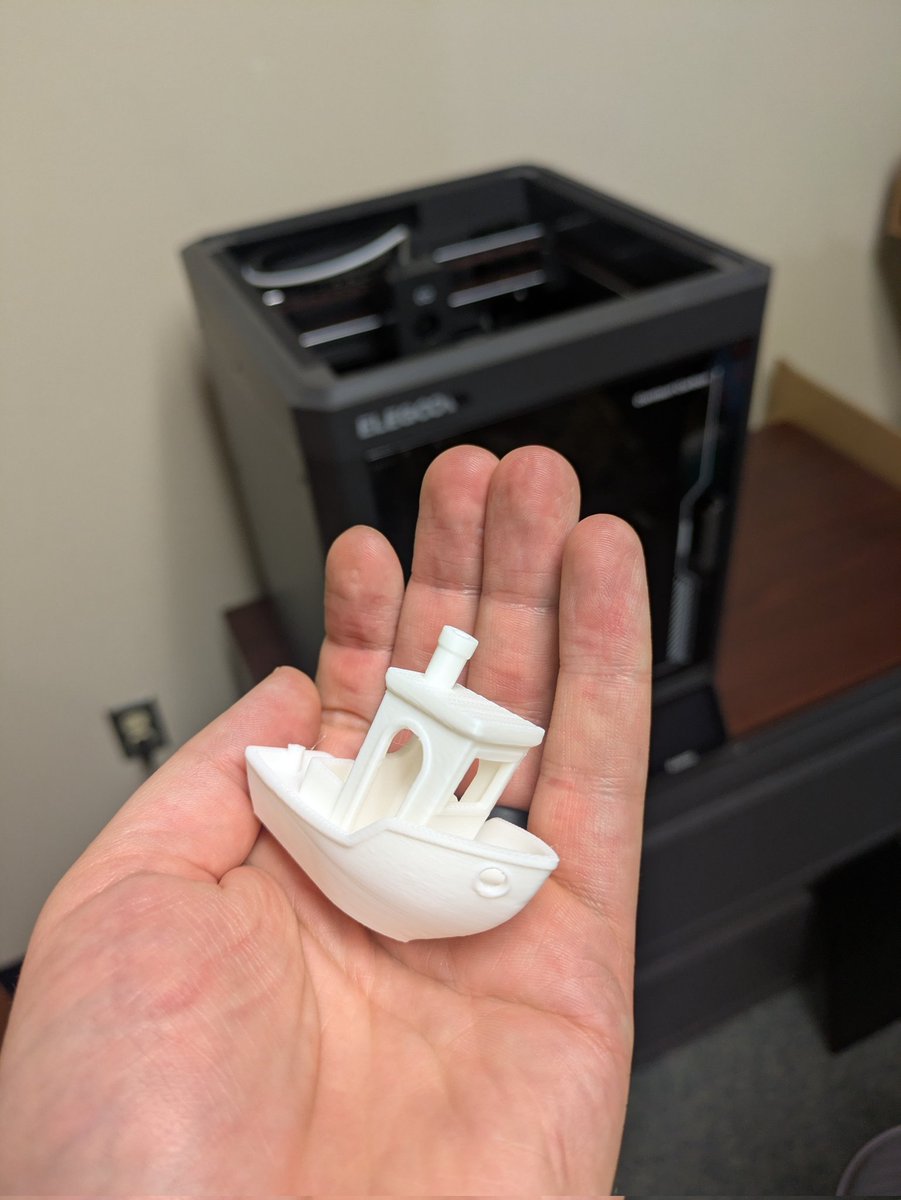 GameSliceShop's tweet image. First print a success. It&apos;s amazing to me coming from an Ender 3v2 to this.  Pulled out of the box, ran the calibration and printed a benchy in 15 minutes.