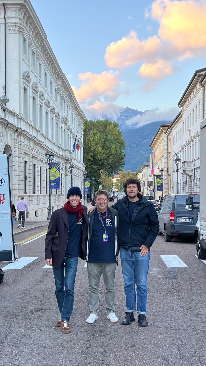 vitruvianvr's tweet photo. Dear Vitruvianists, in just one week, the Vitruvian VR core team traveled hundreds of kilometers, from Sardinia to Trentino. We spent great hours with the faculty and students of Economic Sciences at Cagliari University. We shared the story of how Vitruvian VR was born and learned profound lessons about Sardinia’s ancient matriarchal values and the need for new ways to organize today’s society. We swam in the stunning Poetto at sunset, only to find ourselves hours later in the mountains of Rovereto for Wired Next Fest. 
Together, we brainstormed extensively about the new Vitruvian VR model and its software, discussing graphic cards and the networks that power them, the interconnectedness of forests through fungi, the power of the Greek Pi and the elegance of the golden ratio—all while savoring exquisite wines, from Teroldego to Cannonau. @Chris Mariotti we missed you in L.A. but there will be other chances to spend time together soon! 
At Vitruvian VR we believe that a company’s valuation is less about finance and more about the human value that drives it. Because at Vitruvian VR we design virtual worlds with our bare feet rooted in our vegetable gardens. We envision humans at the center of the equation, empowered by machines—not the other way around. We want machines that build bridges, not destroy them. We imagine virtual worlds that do not isolate us but reflect our deepest nature. 
So, let’s cheer up and embrace the present, with the Augmented World Expo 2026 (#AWE) on the horizon!