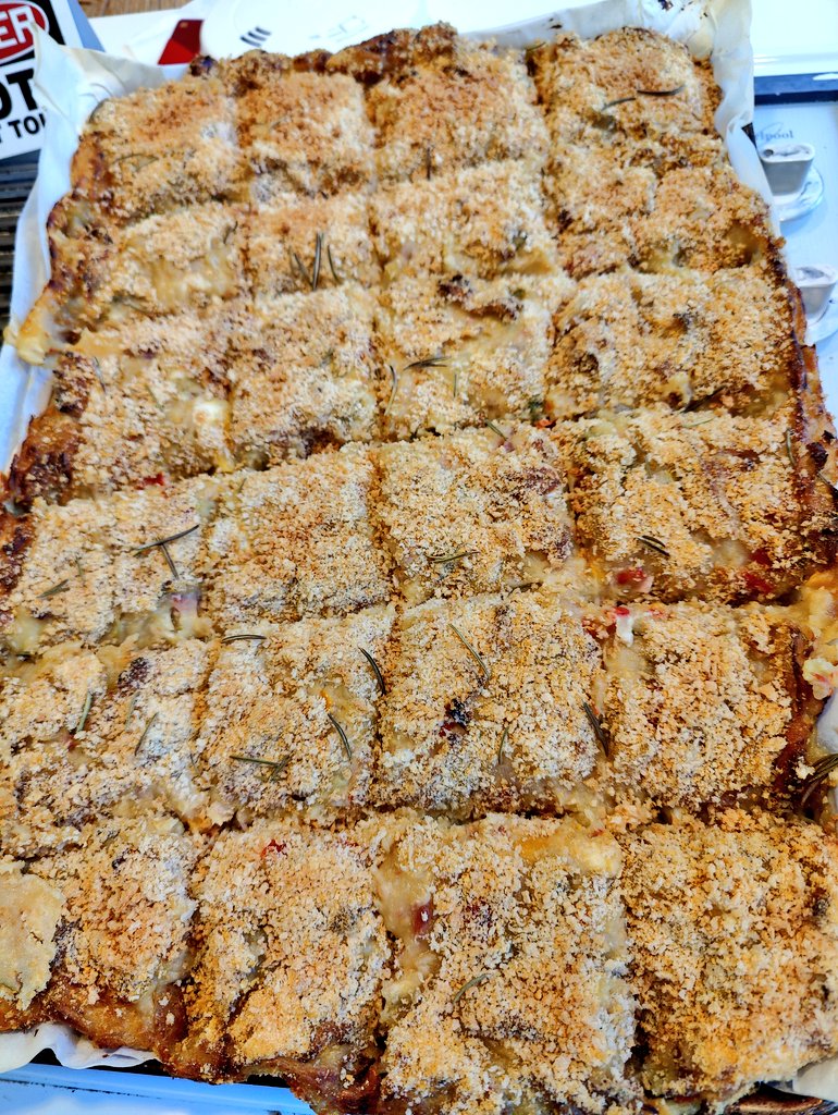 Twice baked mashed potatoes with bacon, black forest ham, fresh rosemary, fire roasted red onion, green onion, roasted red peppers, yellow peppers, pickled jalapenos with smoked extra sharp cheddar, gorgonzola, fresh mozzarella &amp; picante provolone topped with corn flakes &amp; crumbs