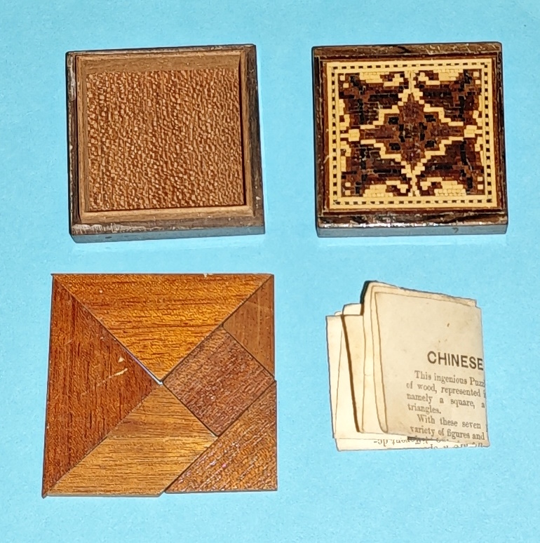 System11b's tweet image. Here&apos;s something interesting I picked up, I&apos;ve always enjoyed Tangram - this one is over 100 years old, in a Tunbridgeware box (19th century).  At the bottom we can see the maker sold these at The Crystal Palace, after the building was relocated to Sydenham in 1854.

I think this…