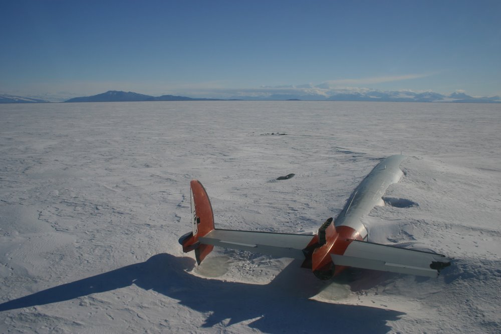 ron_eisele's tweet image. 8 October 1970. Lockheed Constellation C-121 &apos;Pegasus&apos; made a forced landing on unprepared terrain in bad weather at McMurdo Station, Ross Island, Antarctica. No injuries, the Constellation remains in-situ, half-buried in snow.