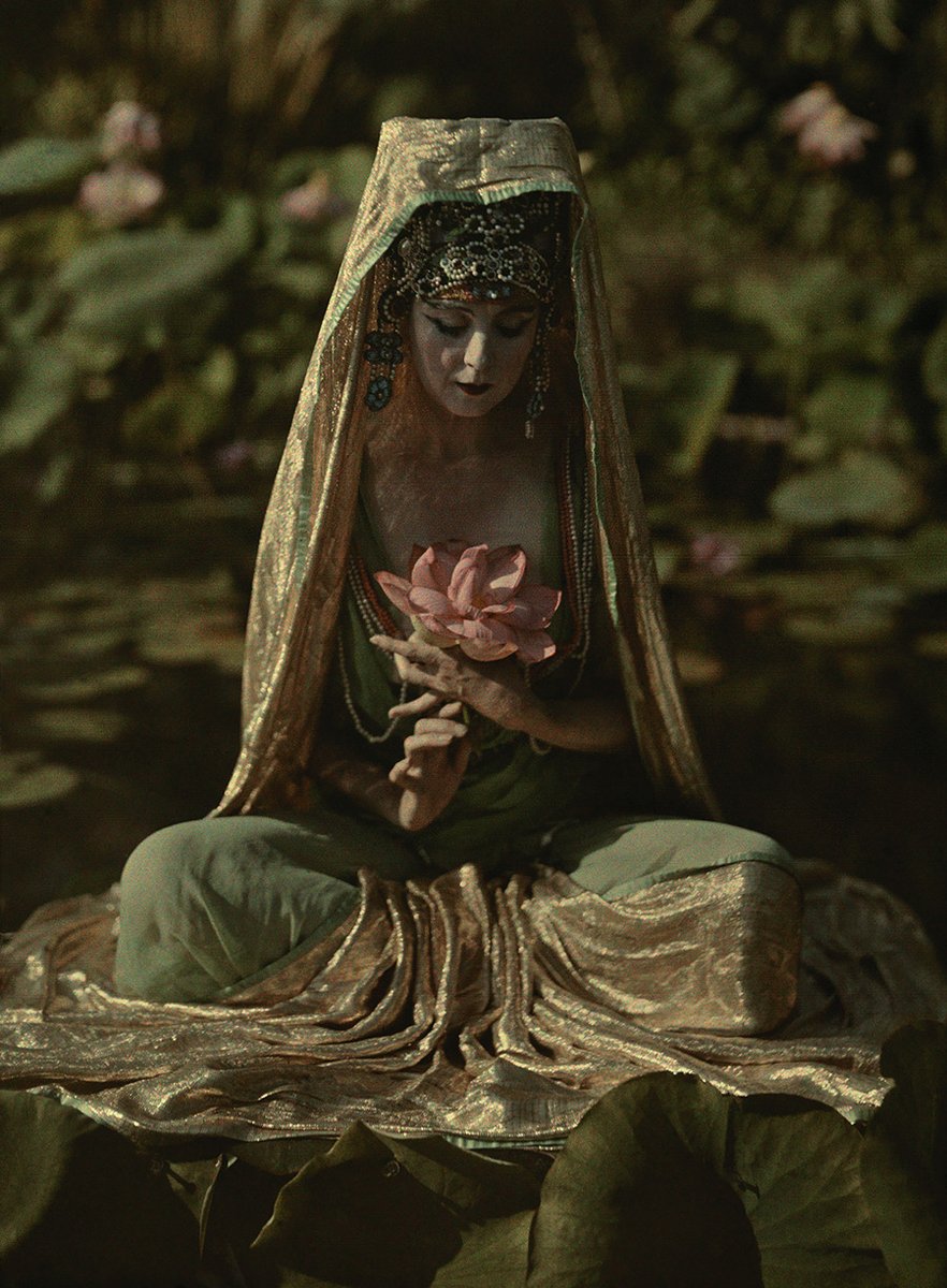 In 1915, Franklin Price Knott took this early color photograph of an unknown woman dressed as the Buddhist bodhisattva Guanyin.

We can now identify this woman as Ruth St. Denis, who was known for her dance performances as Guanyin during this time.