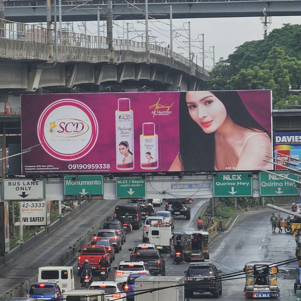 Sparkle_GMA's tweet photo. All eyes on her — fierce, flawless, unforgettable ✨ 

Spotted: AZ Martinez turning heads in her stunning debut billboard for SCD at EDSA Balintawak❣️

#AZMartinez https://t.co/qHaj0BR6Nz