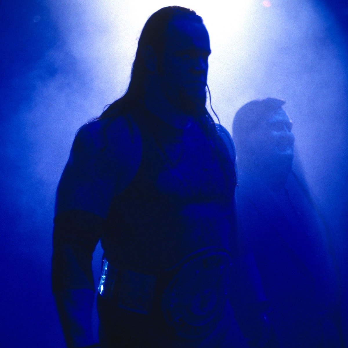 WWFWrestling1's tweet image. 📷 Menacing shot of WWF Champion, Undertaker alongside Paul Bearer as they make their way to the ring at the 1999 King of the Ring pay-per-view. #WWF #WWE #PaulBearer #Undertaker