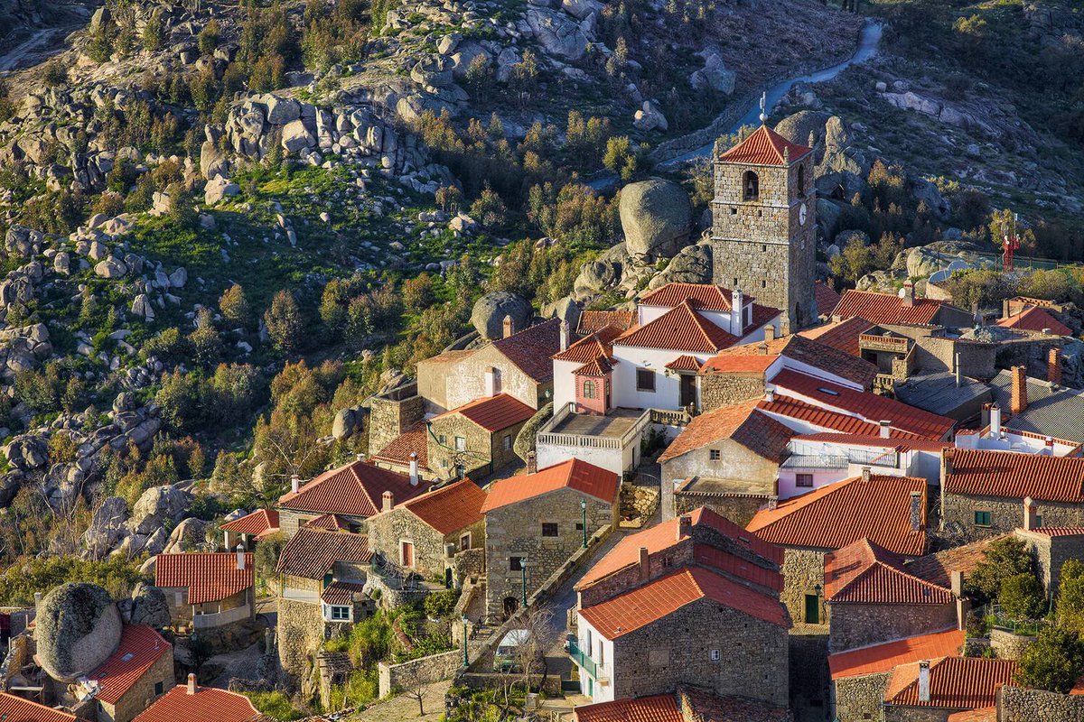 alentejo_1970's tweet image. #Forbes recently named #Monsanto as one of the most beautiful villages in the world. The village is built between huge granite boulders, with houses, streets, and even small gardens hidden in the rocks. Recently, it was used as a filming location for &quot;House of the Dragon&quot;.
