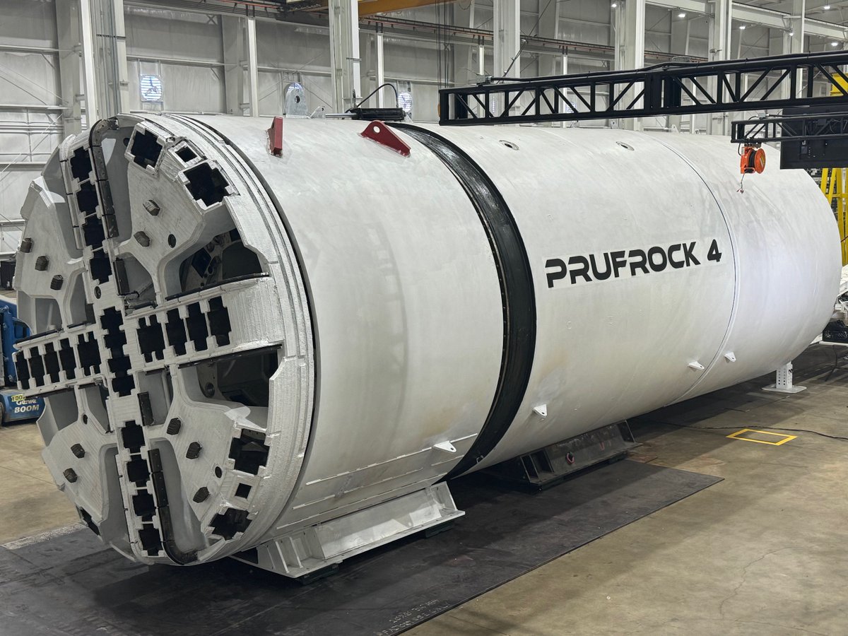 The Boring Company’s “Prufrock” tunneling machine can porpoise—it arrives on a truck, tilts down, and launches into the ground within ~24 hours, then resurfaces by mining onto a trailer—so you don’t need huge launch pits or cranes. It’s also designed for “zero-people-in-tunnel”