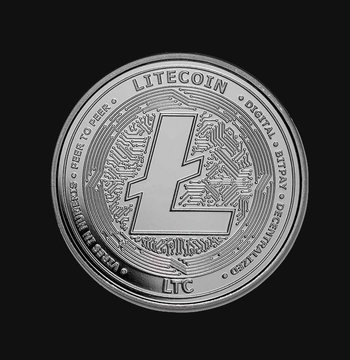 A silver Litecoin coin with the Litecoin logo and text Digital Currency Litecoin on the front, surrounded by circuit patterns. A black circular logo featuring three horizontal lines representing Hedera.