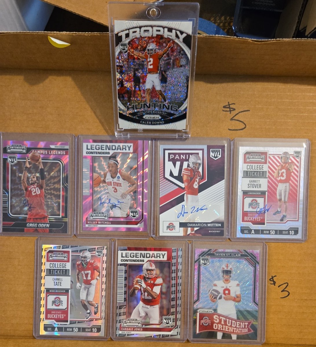 Ripped some OSU NIL stuff! Really good product I think!

All available for sale. Didn't hit any big Smith or sayin I was chasing.

Downs SSP sparkle $85

Oden /99 auto $15

Mitchell /99 auto $45

Witten auto $15

Stover /199 Auto $20

Tate and cardale logo SP $15 ea

Tavien pink