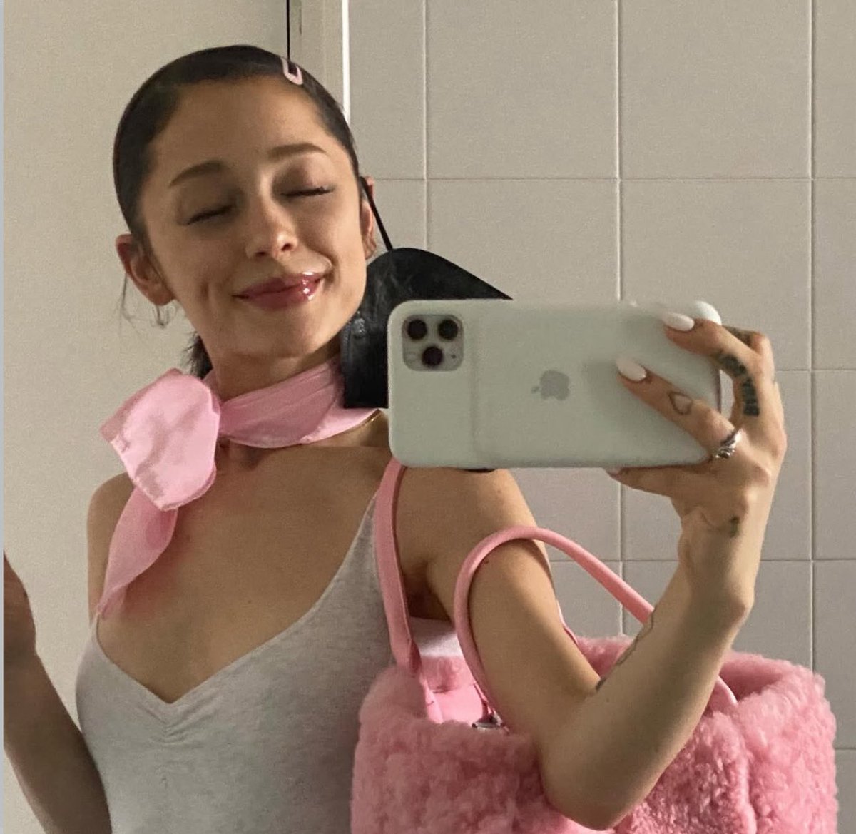 PopBase's tweet image. Ariana Grande stuns in recently shared photos from the set of ‘Wicked.’